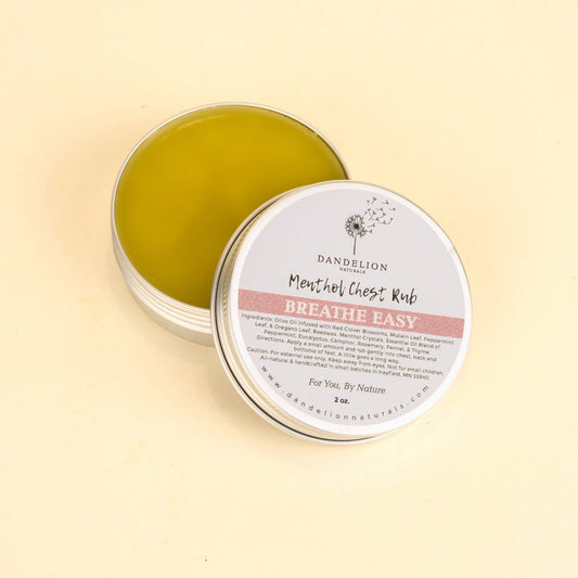 Dandelion Breathe Easy herbal chest rub in a tin, made with menthol and essential oils for respiratory support.