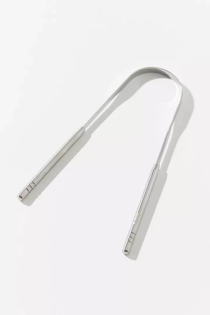 Stainless steel tongue scraper for effective oral hygiene; eco-friendly and non-toxic design by Huppy.