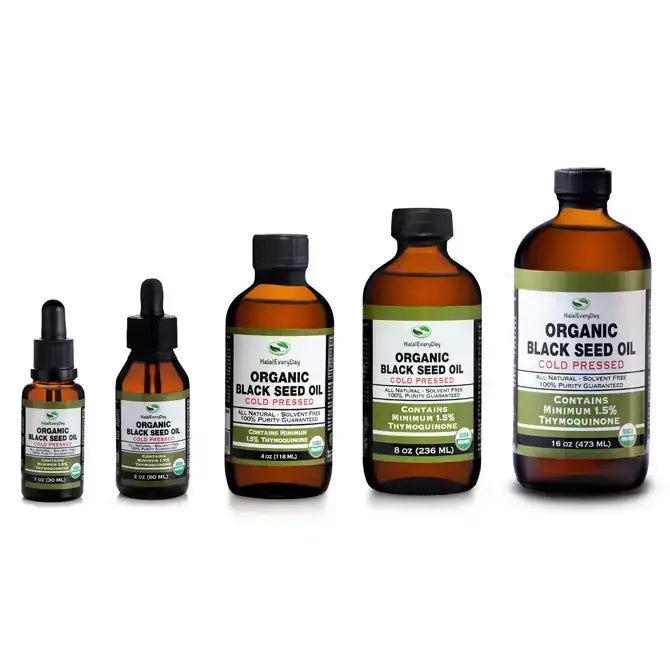 Assorted sizes of Organic Black Seed Oil bottles, cold pressed, certified USDA organic, showcasing thymoquinone content.