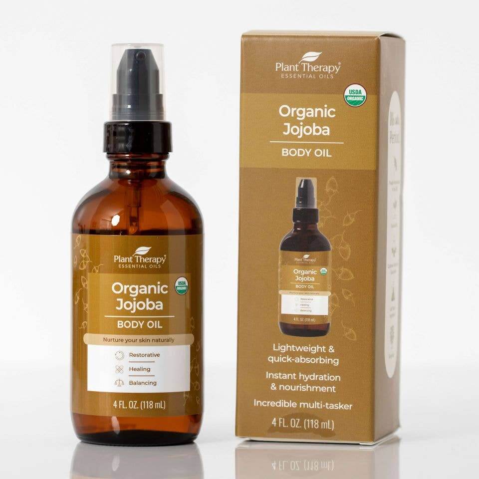 Organic Jojoba Oil body oil in a bottle, with packaging showcasing its restorative and nourishing qualities.