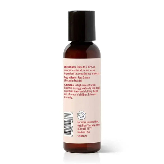 Back label of Extra Virgin Organic Rosehip Oil bottle, detailing direction, ingredients, and caution for usage.