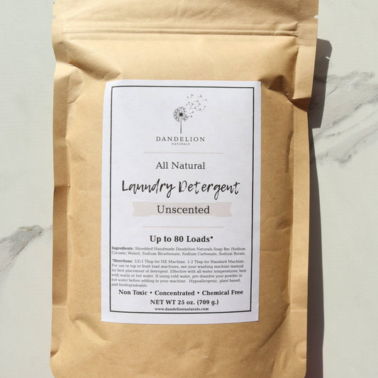 Dandelion Naturals unscented all-natural laundry detergent packaging, safe for sensitive skin, non-toxic, and chemical-free.