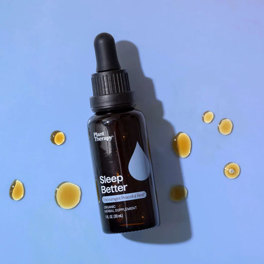 Organic Sleep Better Tincture 30 mL - Natural Supplements bottle with drops on a blue background.