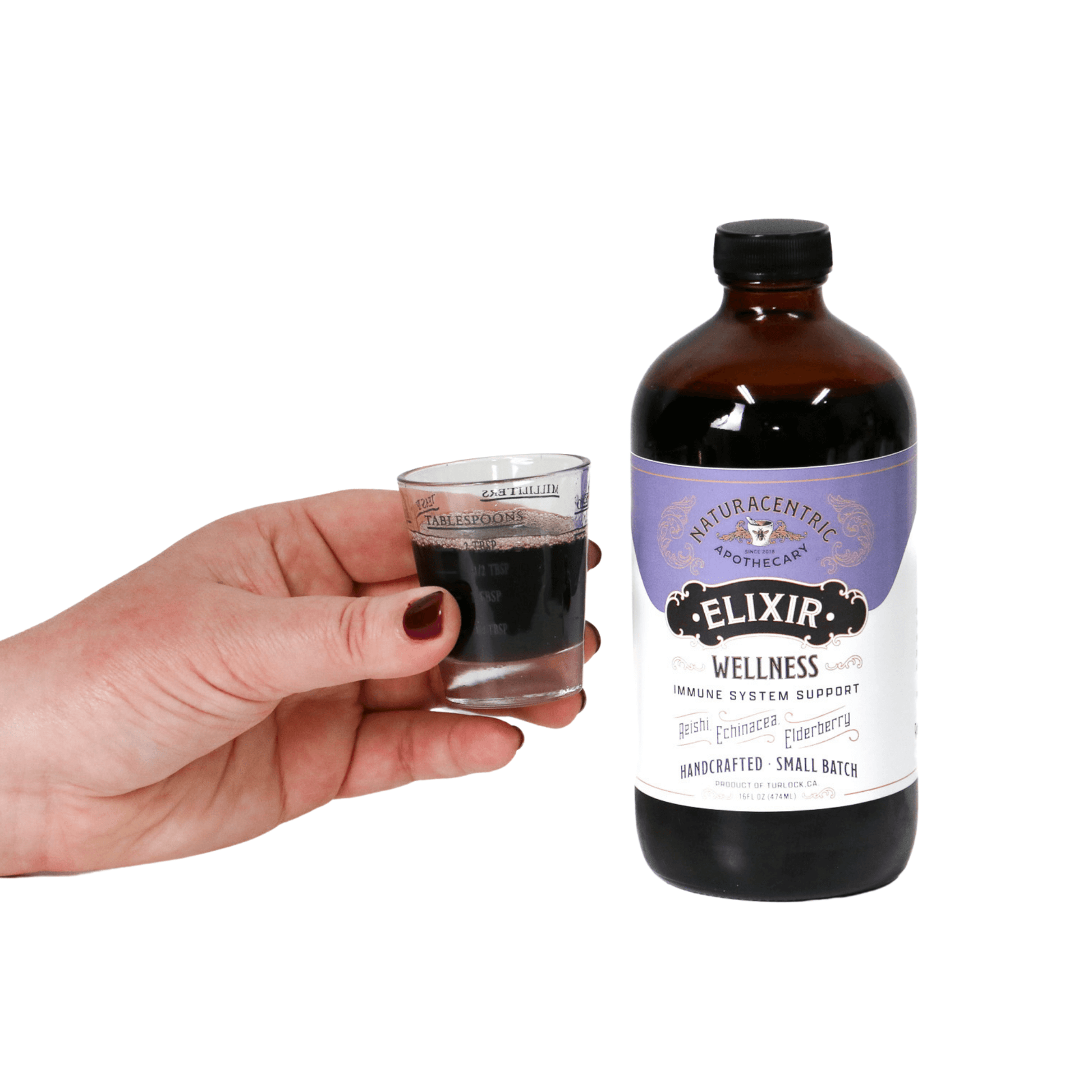 Elderberry Syrup Wellness Elixir: 8oz shown with a shot glass for immune support and wellness boost.