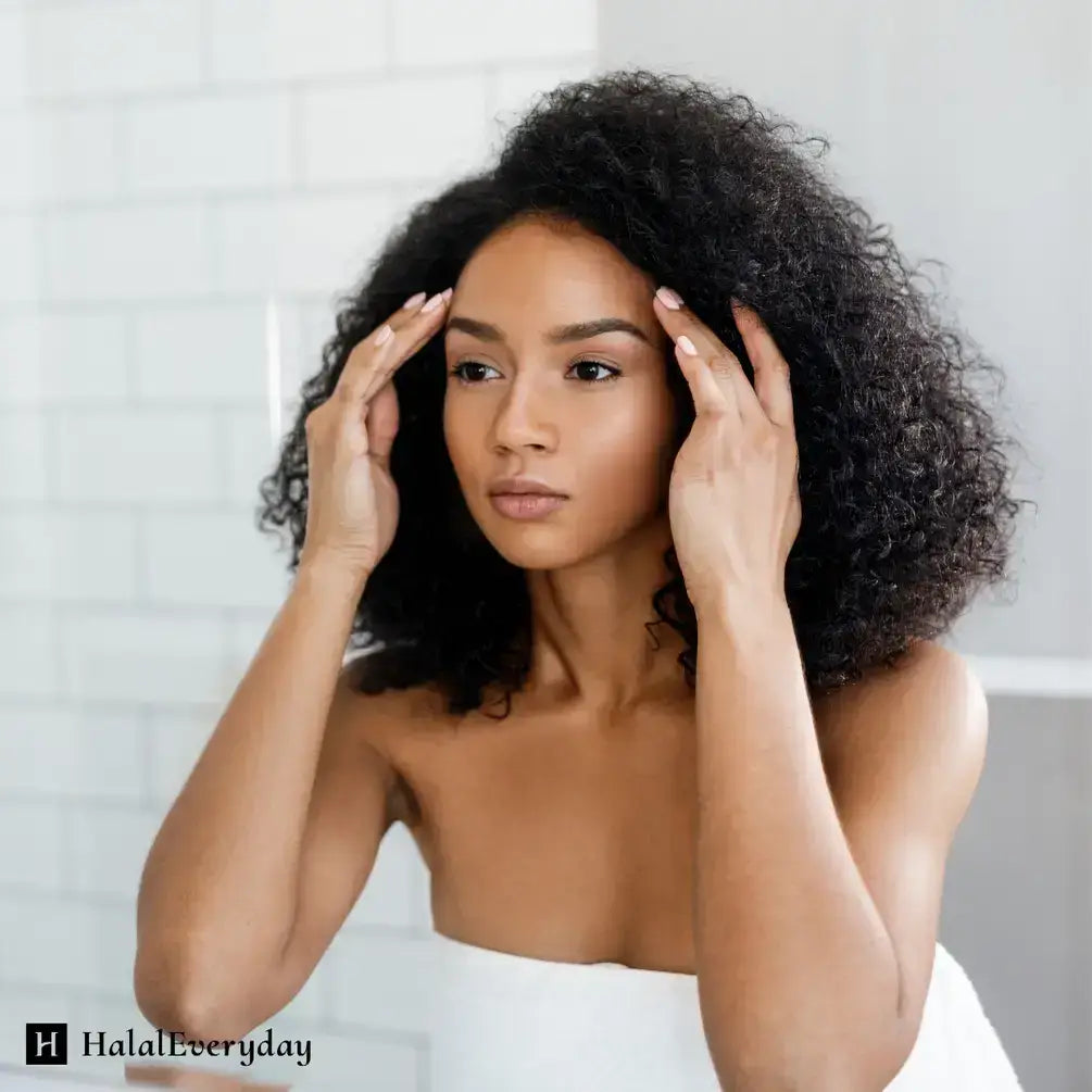 Woman applying skincare treatment, focusing on her face for healthy skin and deep pore cleansing.