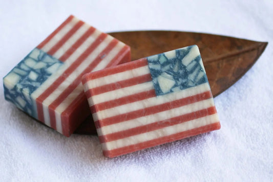handmade, organic soap bar with american flag design in rose petals scent