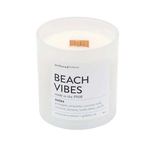 white glass, soy candle with cedar wood wick in beach vibes scent 