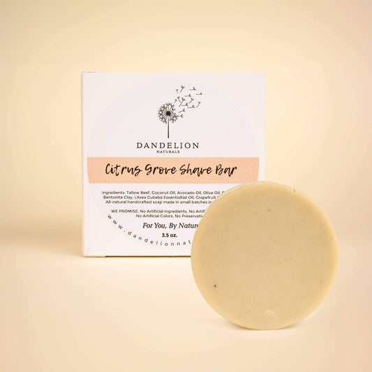 Citrus Grove Shave Bar and packaging featuring tallow and bentonite clay for a nourishing shaving experience.