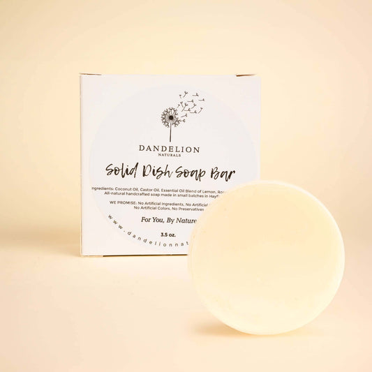 Solid Dish Soap Bar by Dandelion Naturals with eco-friendly packaging and natural ingredients, perfect for reducing plastic use.