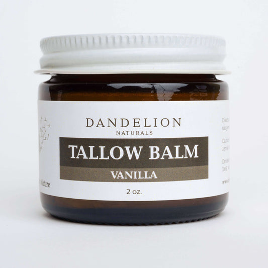 Grass fed tallow balm with vanilla in a 2 oz jar by Dandelion Naturals, nourishing skin for hydration and repair.