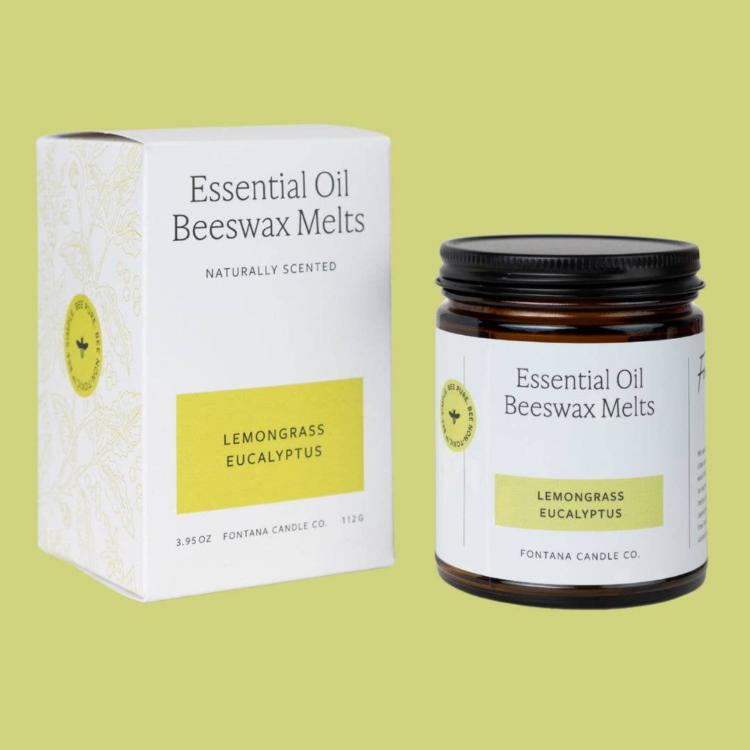 Lemongrass Eucalyptus Beeswax & Essential Oil Wax Melts in a jar and box on green background.