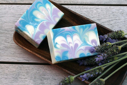 organic handmade soap with beautiful peacock feather design in blue and purple