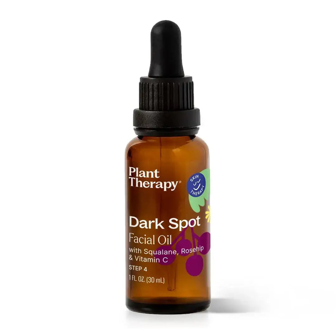 Dark Spot Facial Oil 30ml in amber bottle with dropper, enriched with Squalane, Rosehip, and Vitamin C.