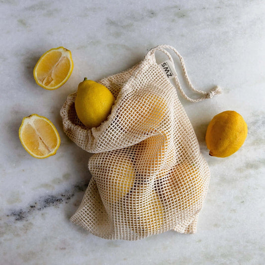 organic cotton produce bag with lemons inside 