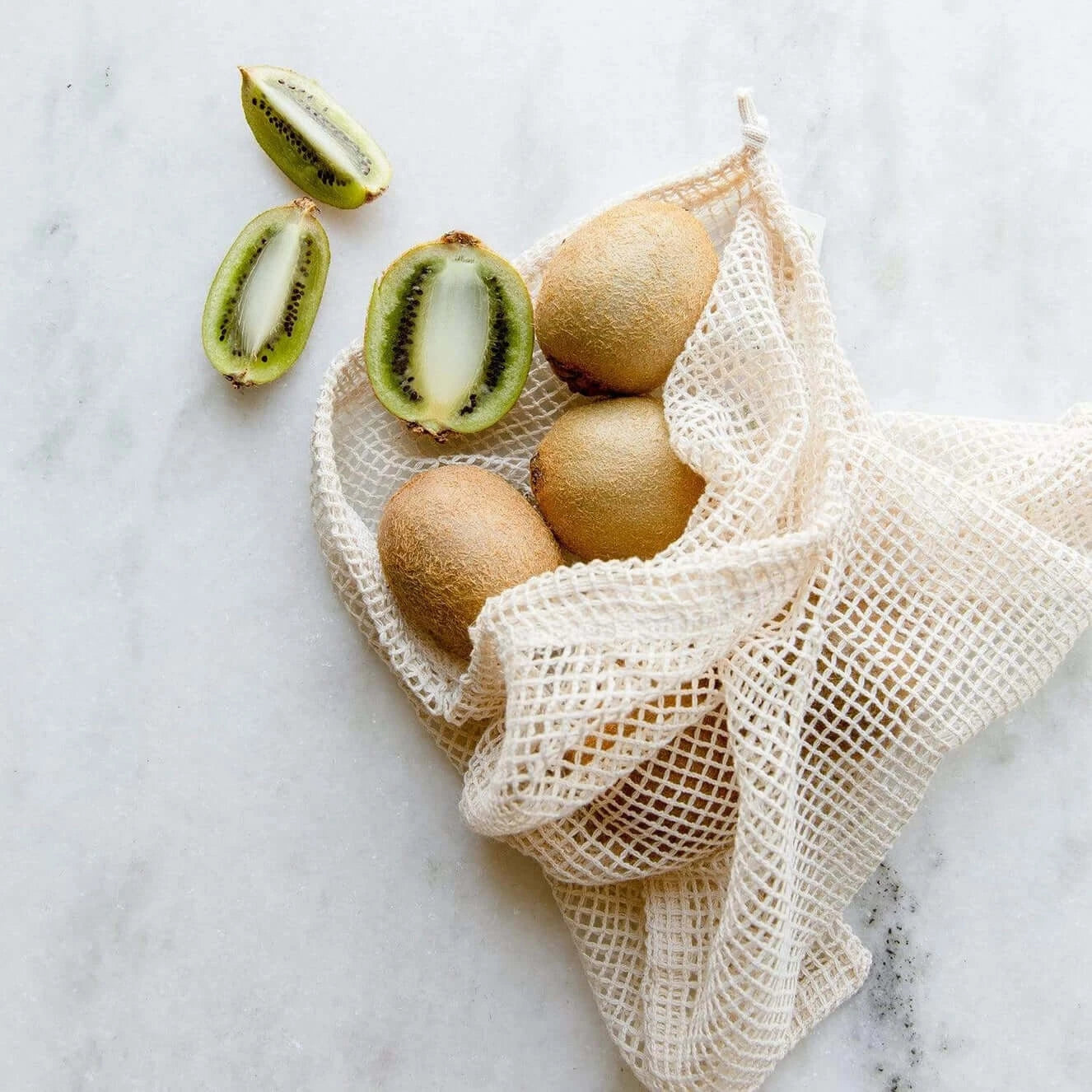 zero waste, large organic cotton produce bag with kiwis inside 