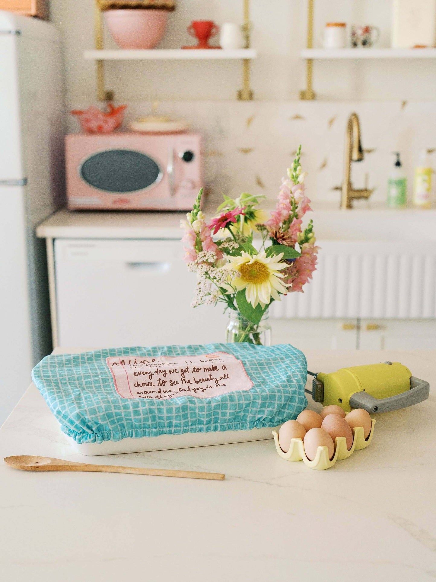 Recipe for a Happy Heart 10x14 Baking Dish Cover | Baking with cheerful design in a bright kitchen scene.