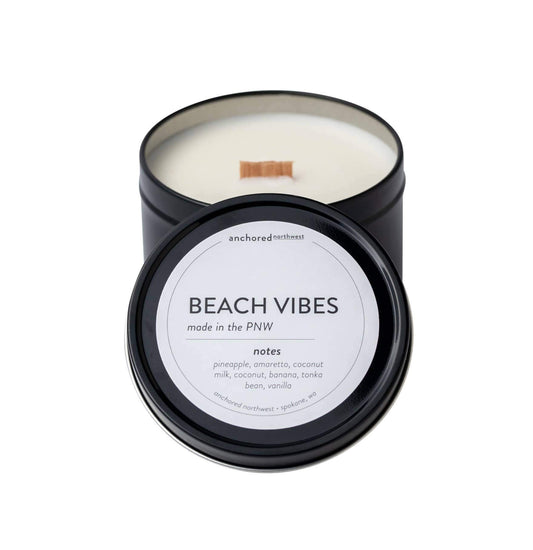 travel soy candle in black tin with lid, beach vibes scent