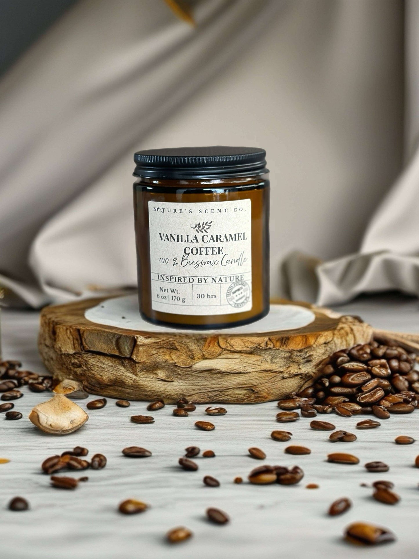 Vanilla Caramel Coffee Beeswax Candle - Non Toxic Candle - Woodwick Candle displayed on wood slice with coffee beans.