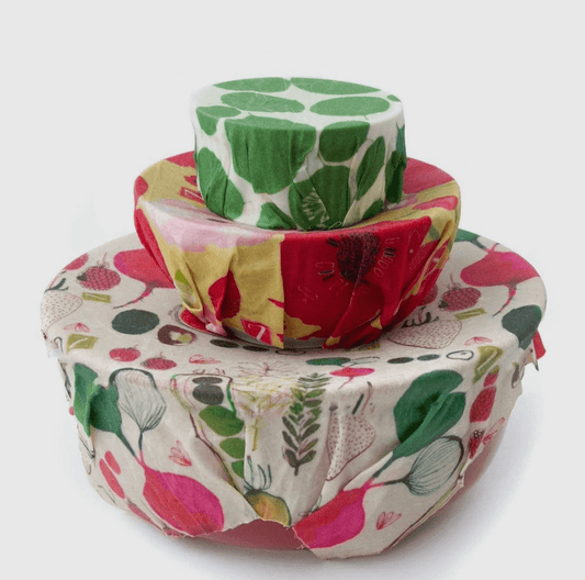 stacked small, medium and large bowls wrapped in z wraps reusable beeswax food wraps